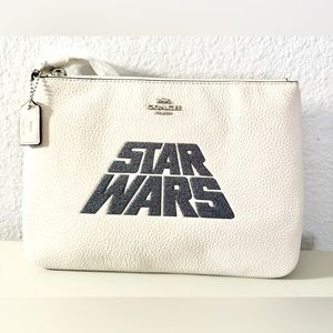 NWT. Limited Edition. Large Star Wars zip Wristlet. May the Force Be With You!!!